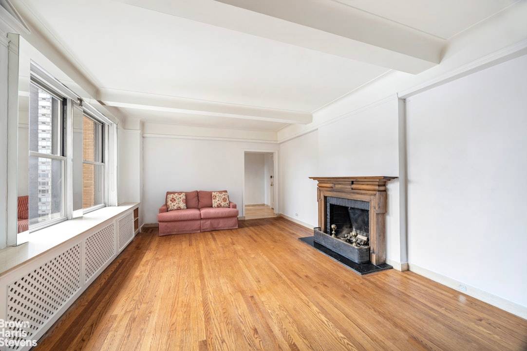 Apartment 15J is a bright, south facing one bedroom home located at the front of the building, offering views that clear the building across the street.
