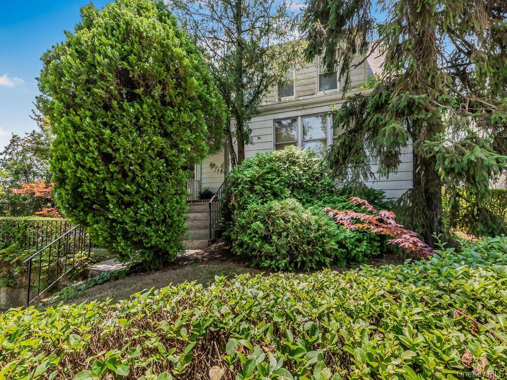 Legal two family home on oversized lot in a most convenient location.