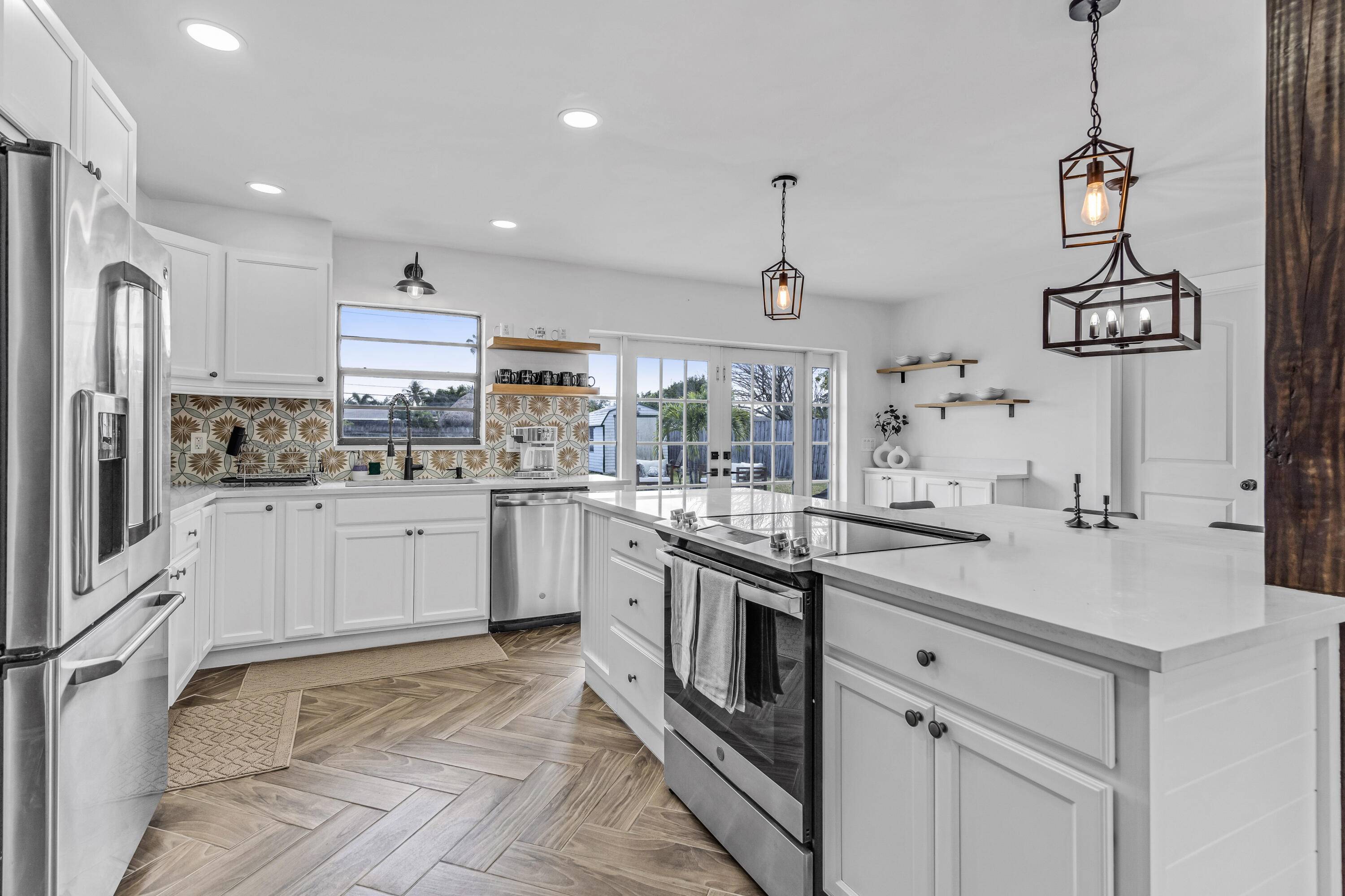 Experience the perfect blend of style, comfort, and convenience in this stunning two story home located just minutes from West Palm Beach !