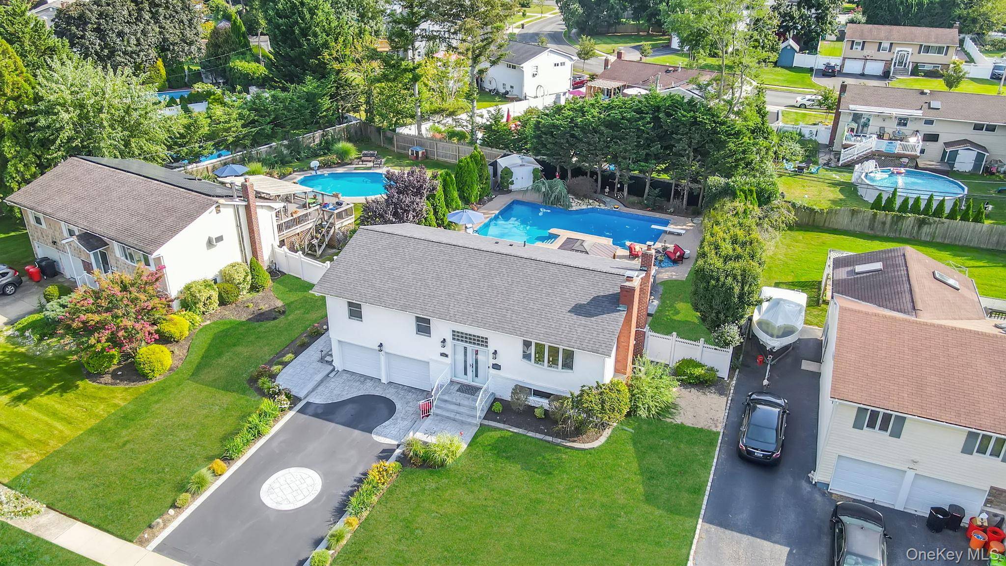 Welcome Home To This Stunning amp ; Meticulously Kept Hi Ranch Nestled Mid Block In The Award Winning Kings Park School District Featuring 3 Bedrooms, 2 Newly Renovated Full Bathrooms, ...