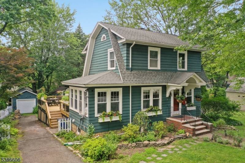 This classic and charming Colonial sits gracefully on a quiet, tree lined street, full of personality and thoughtful updates.