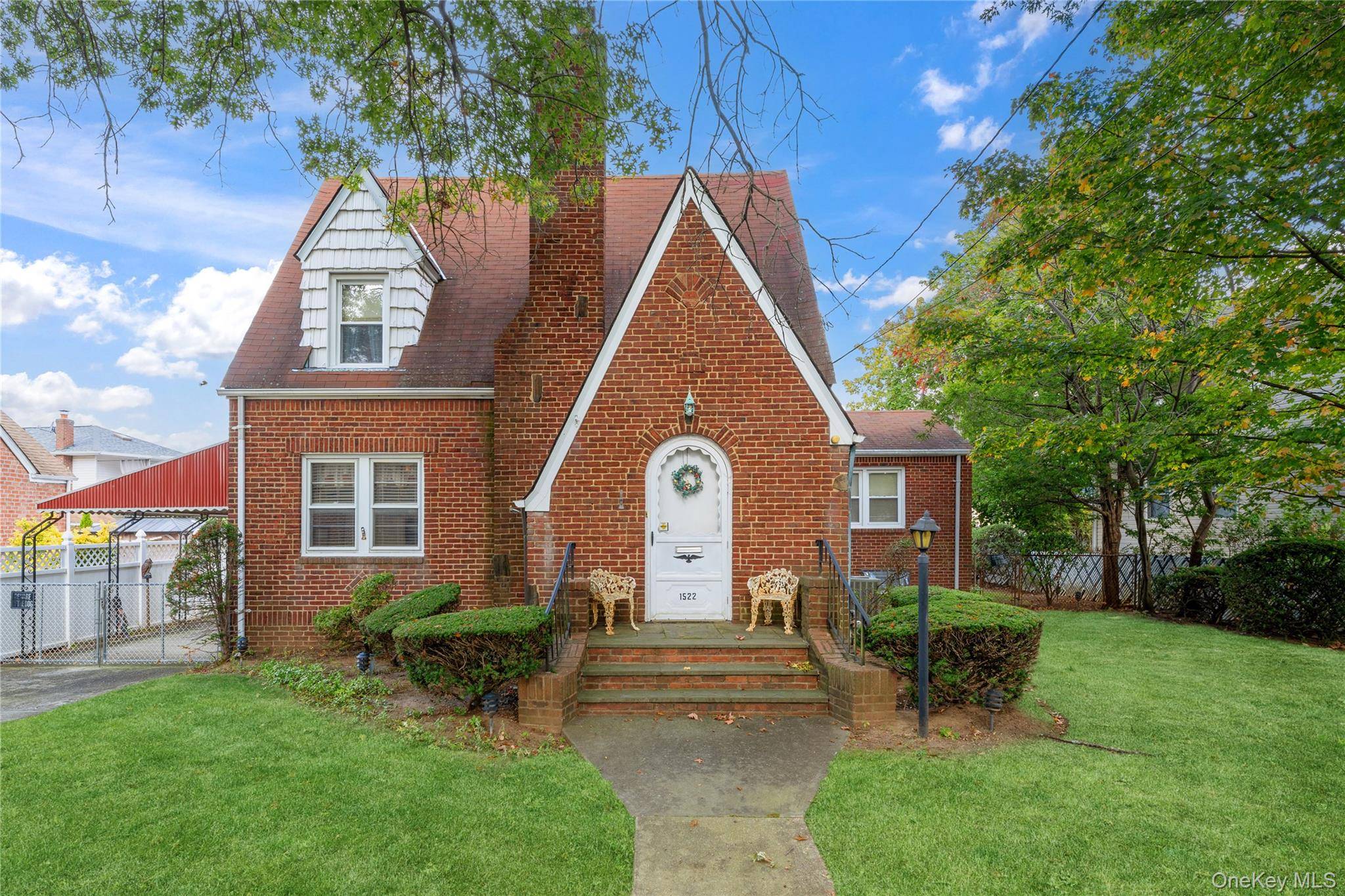 Very unique all brick cape in the heart of Elmont.
