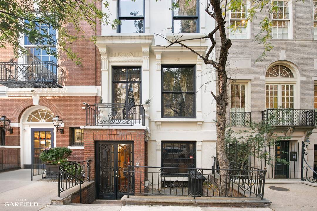 51 East 75th Street is a distinguished two family townhouse, currently configured as a lower triplex and an upper duplex.