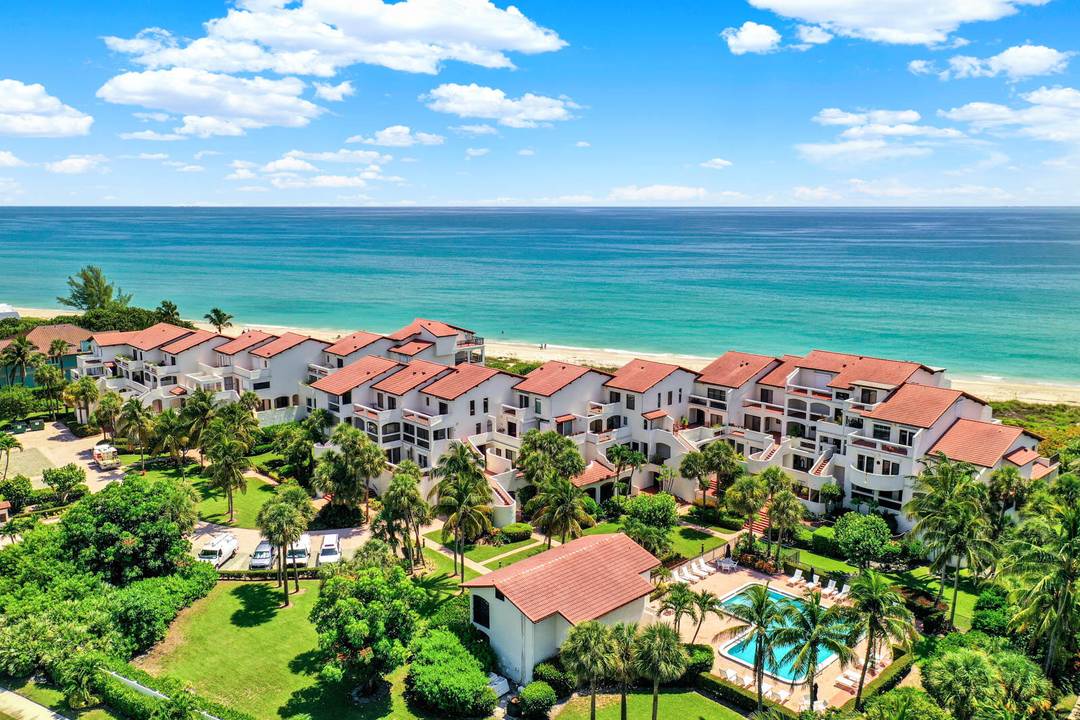 THE DUNE CONDOMINIUM ON HUTCHINSON ISLAND very rare, two level townhome with Ocean views and nearly 3000 square feet of finished living space.