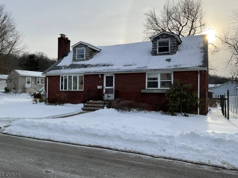 This spacious 4 bedroom, 2 bath home offers a solid foundation and excellent potential for customization.