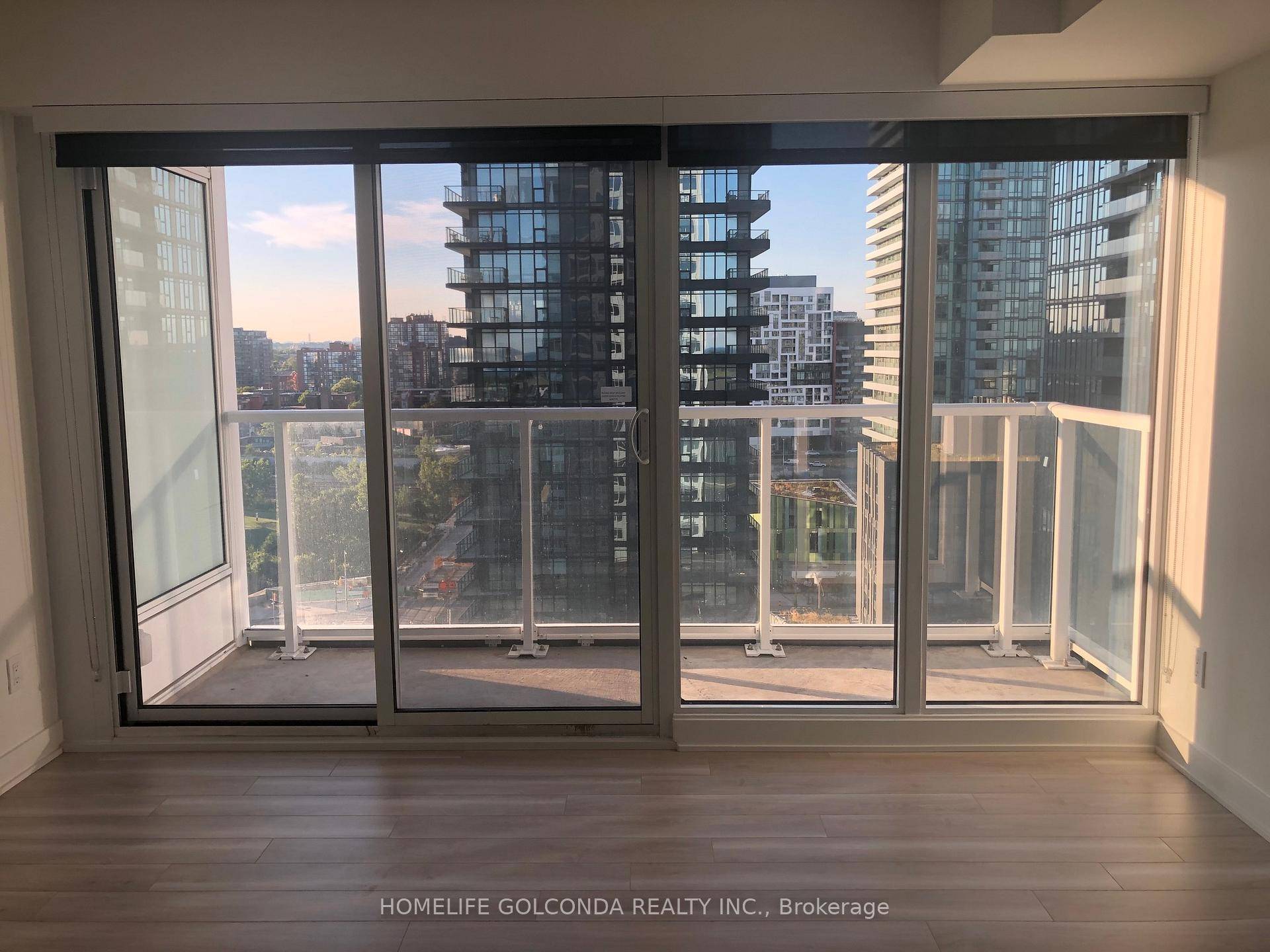 Bright 1 Br Unit, North Facing, Modern Kitchen, Elegant Marble Bathroom, Functional Layout, Laminate Floor Throughout.