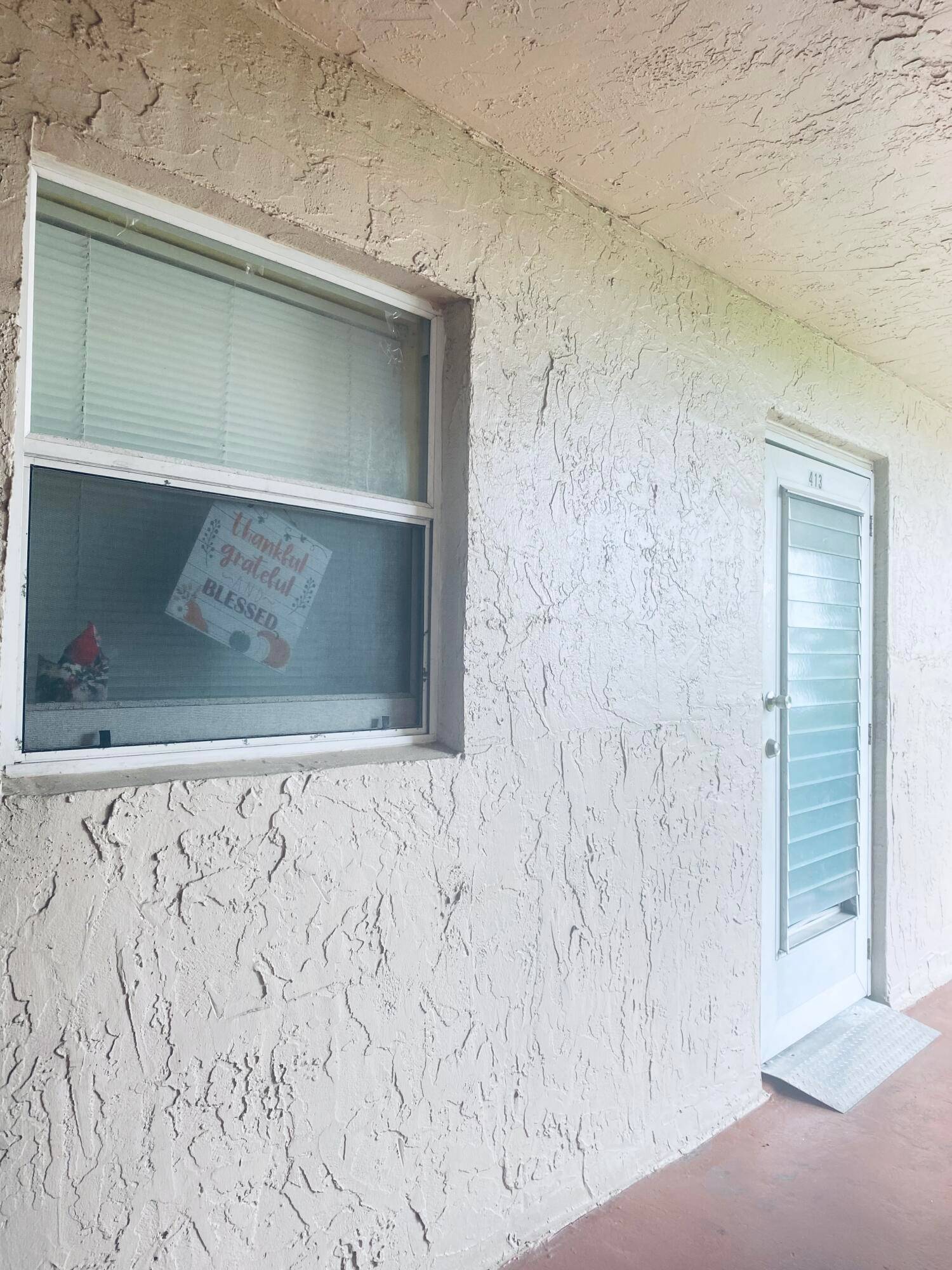 Enjoy stunning lake views from the enclosed porch of this charming unit.