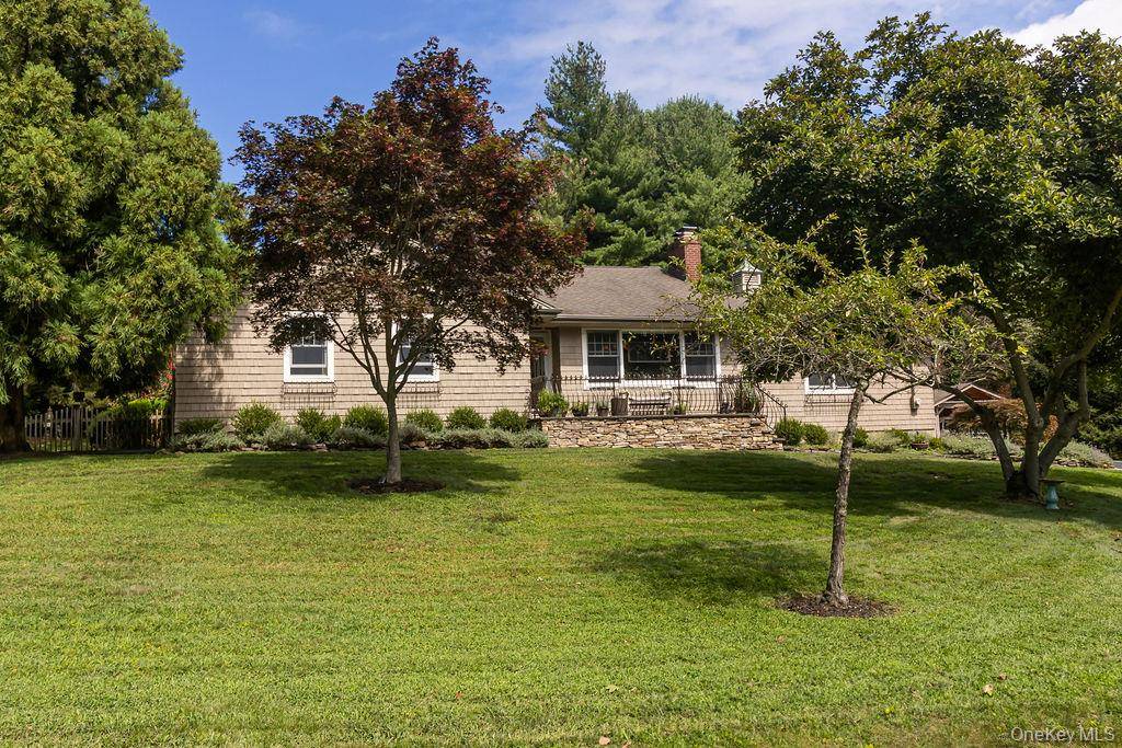 This immaculately maintained three bedroom Craftsman Ranch is situated in a prime location in the heart of picturesque Stony Brook Village.