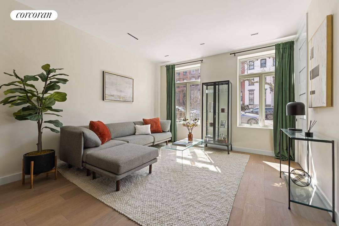 Welcome to 21 Lefferts Place, Unit 1 a thoughtfully designed two bedroom, two and a half bathroom garden duplex spanning 1, 566 square feet, complete with over 800 square feet ...