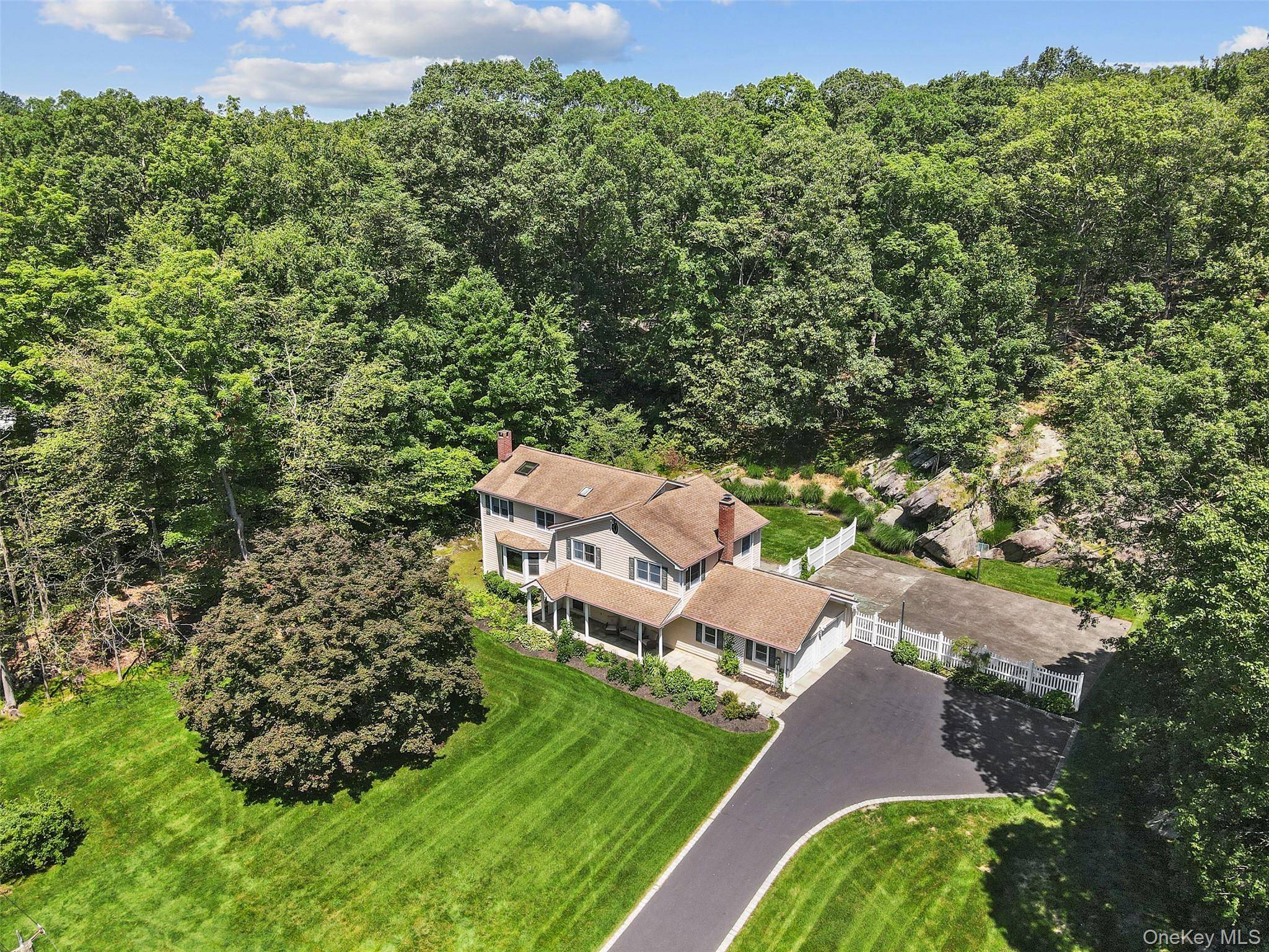 Refreshed Windmill Farms expanded and updated five bedroom split level home with beautiful private property.
