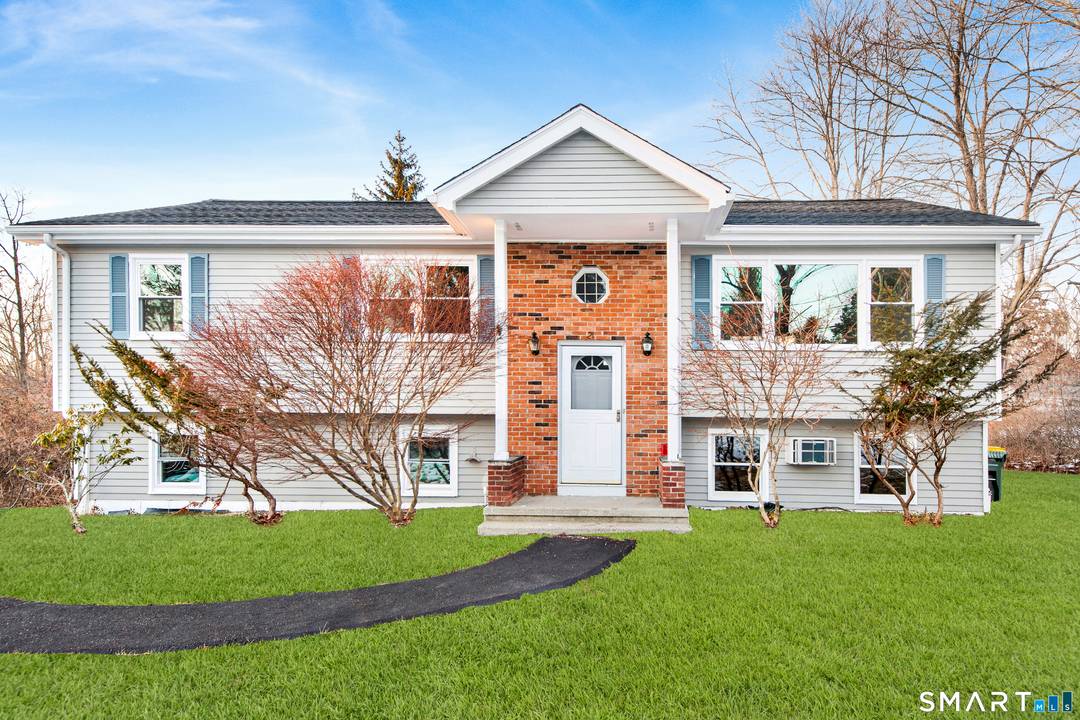 Welcome to this beautifully and renovated home offering 2, 092 square feet of comfortable, modern living set on just under one half acre of land.