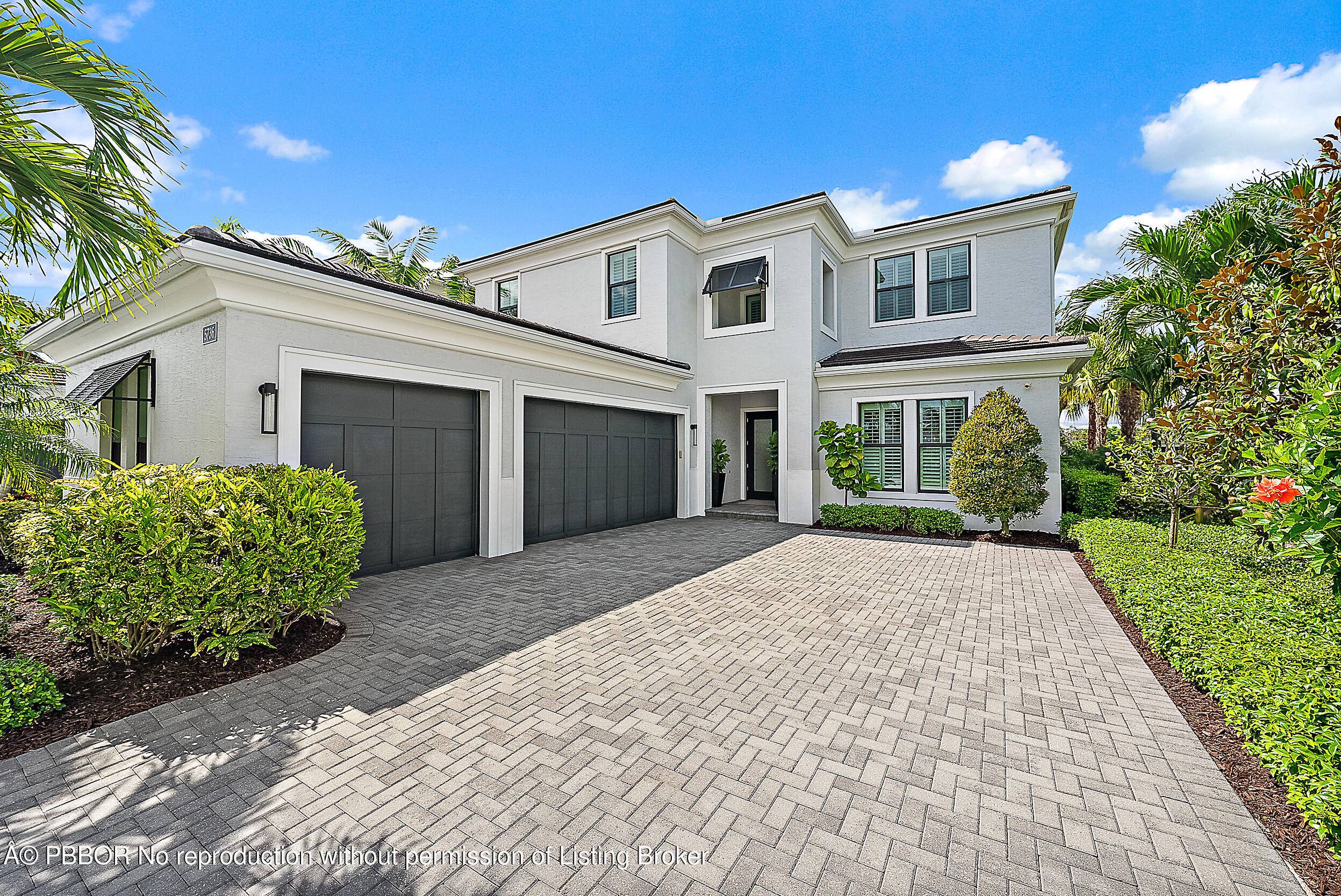 Perfectly situated in the center of Artistry, this home offers a peaceful water view and desirable southern exposure, filling the interior with natural light throughout the day.