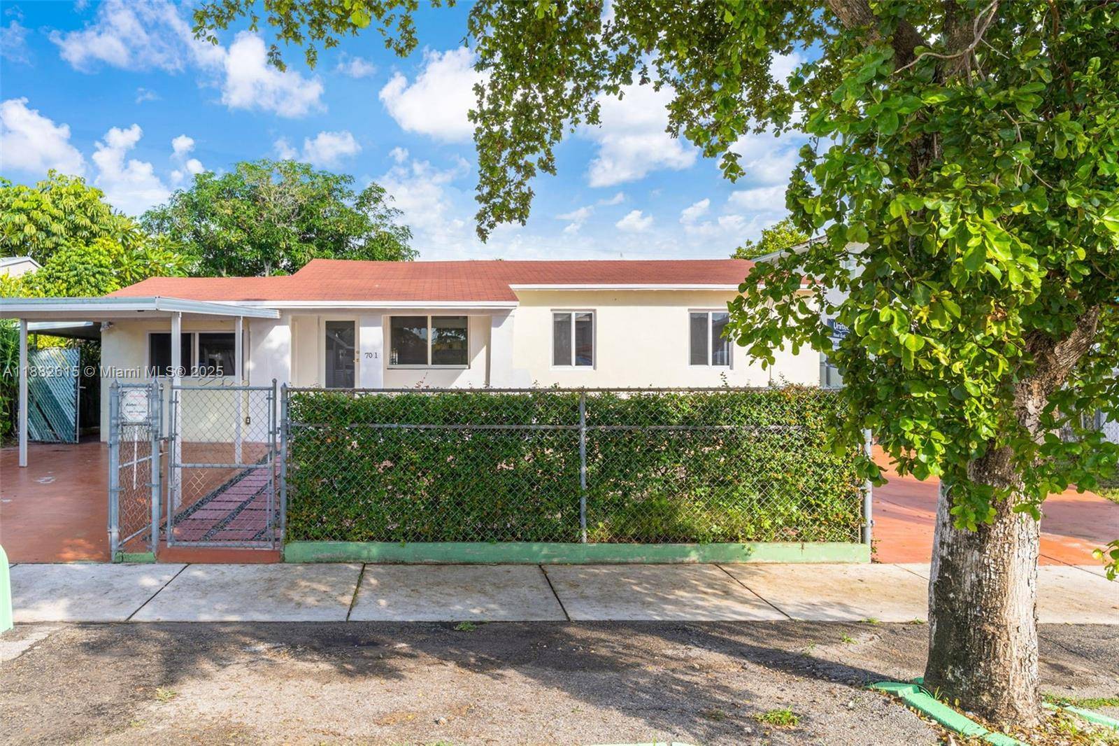 This charming and meticulously maintained home offers close to SW 8 Street, a versatile living arrangement that suits various needs.