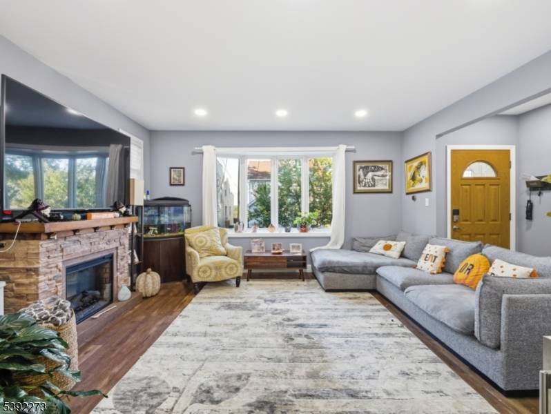 Welcome to this beautifully maintained three family home offering the perfect blend of comfort, income potential, and modern upgrades.