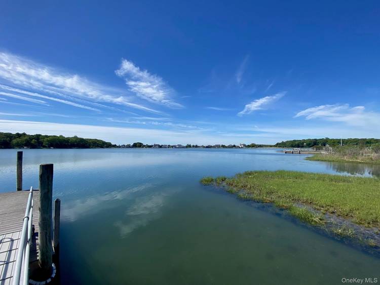 Broadwaters Cove Bliss The Ultimate Peconic Bay Summer Retreat Welcome to your quintessential seasonal getaway on Broadwaters Cove, where classic, laid back summer camp nostalgia meets modern comfort.