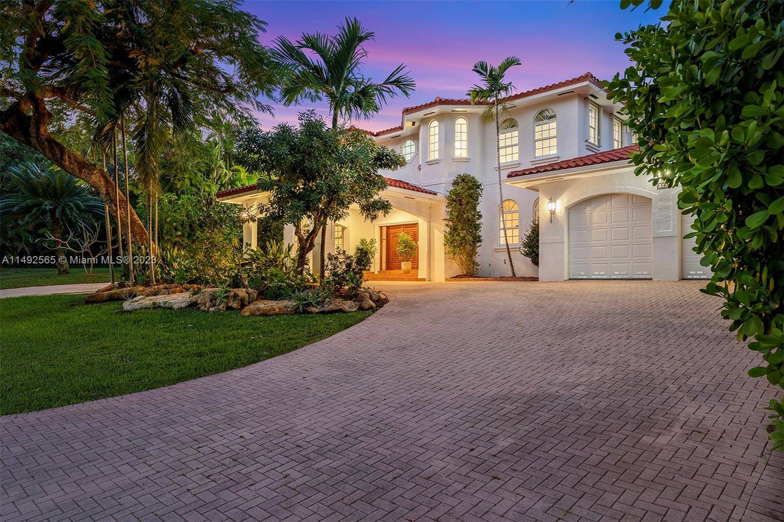 Experience timeless elegance in Coral Gables on prestigious Sunrise Avenue.