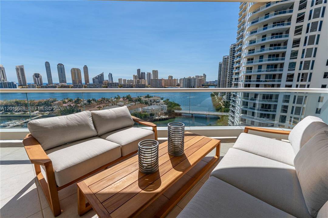 Stunning 4 bedroom, 3. 5 bath residence at 7000 Island Blvd, Apt 1402, featuring newly updated flooring, a remodeled kitchen and ceilings, and brand new window treatments.