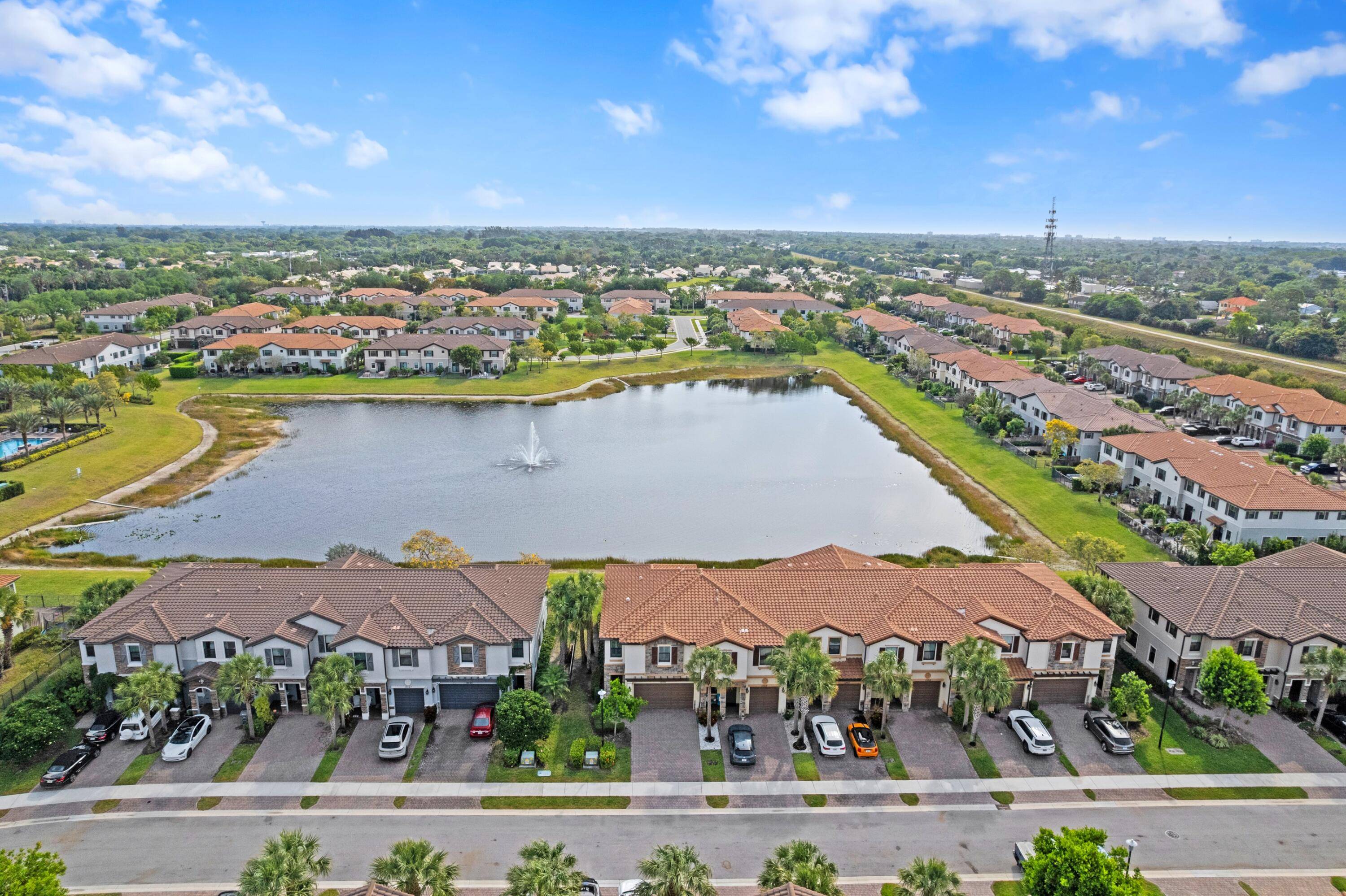Enjoy stunning lake views and peace of mind living in the newer gated community of Cambria Parc.