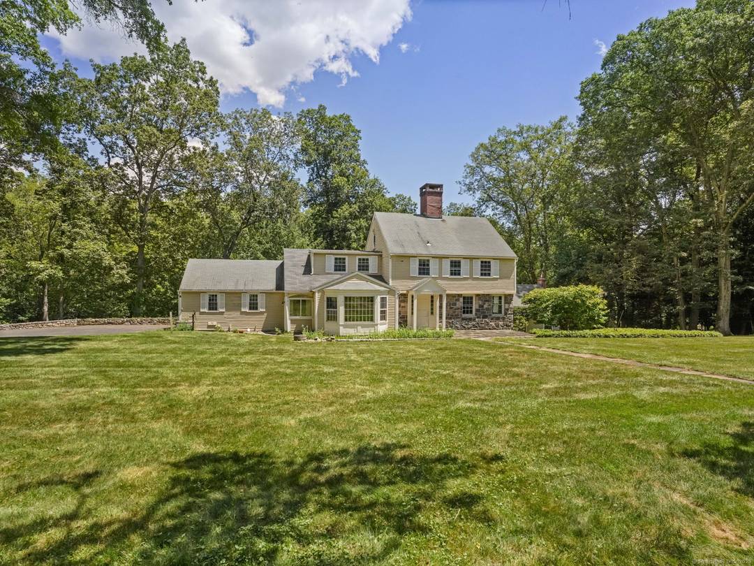 Idyllic riverfront property in Lower Weston a builder's dream with both main house and barn transformations.