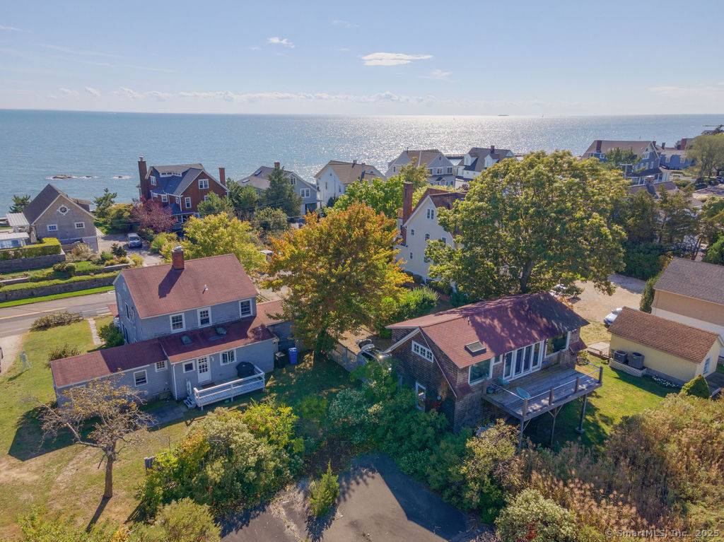 Charming beach home with full guest apartment above garage across the street from Long Island Sound.