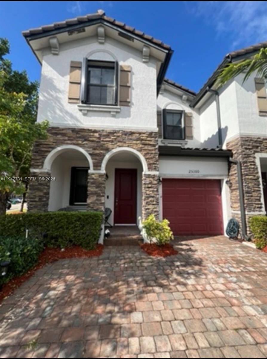 Beautiful corner unit townhouse in the desirable Artesa community featuring 3 bedrooms and 2.