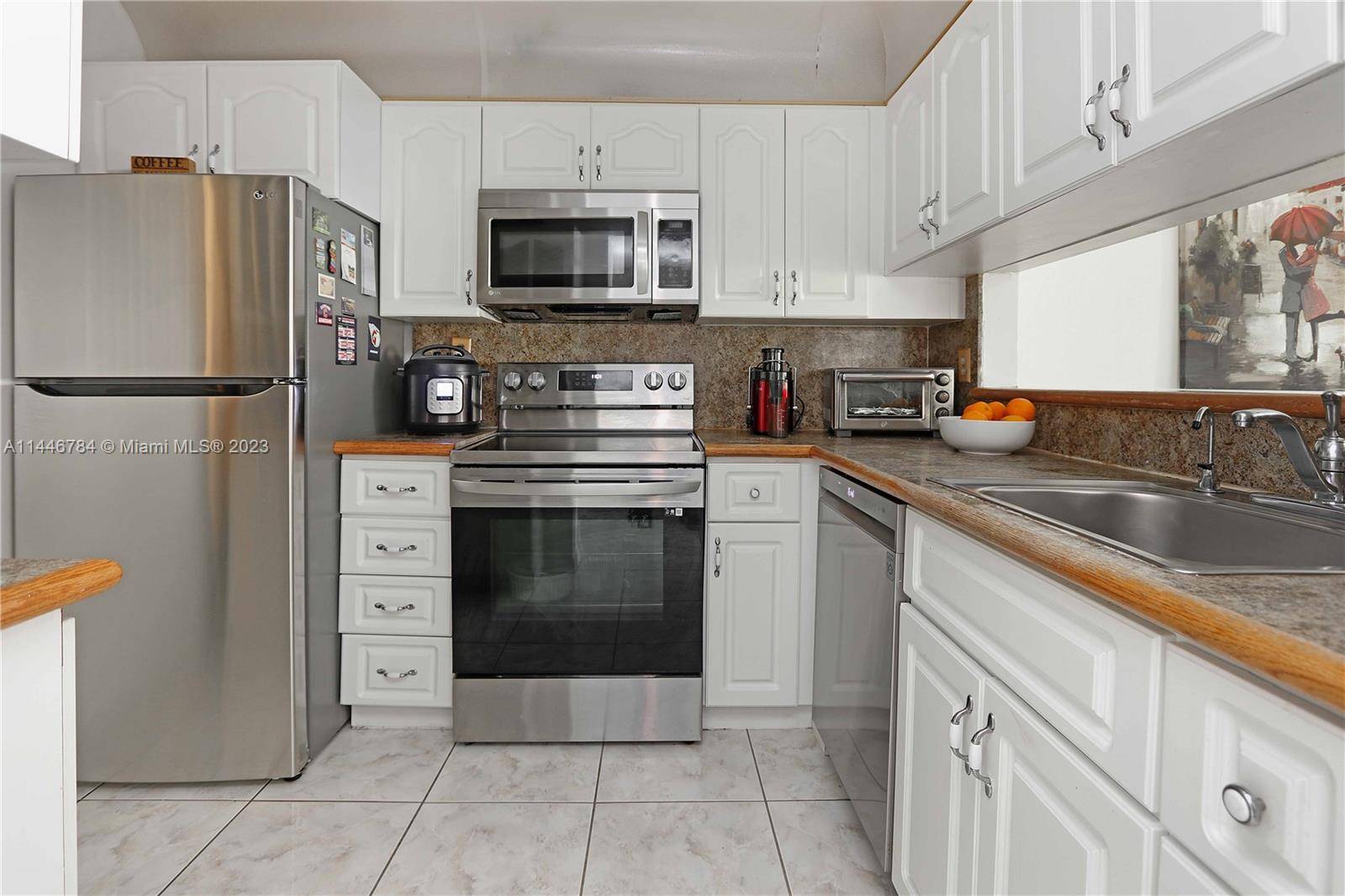 Discover serene living in this immaculate 2 bed, 2 bath first floor apartment in Miramar, just steps from University Dr.
