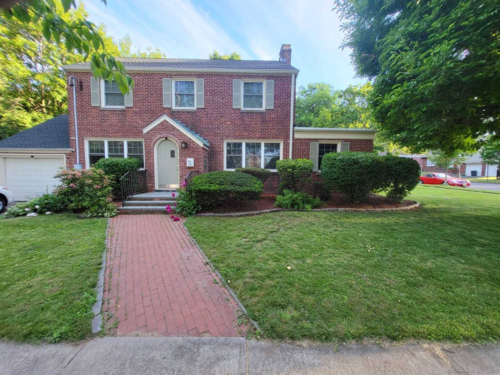 Charming 4 bedroom home with multiple living office spaces a heated sun room and living bedroom suite in the finished basement, which includes a walk in closet, linen closet and ...