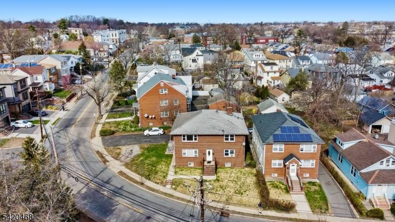 Spacious and well maintained two family home in the heart of Maplewood !