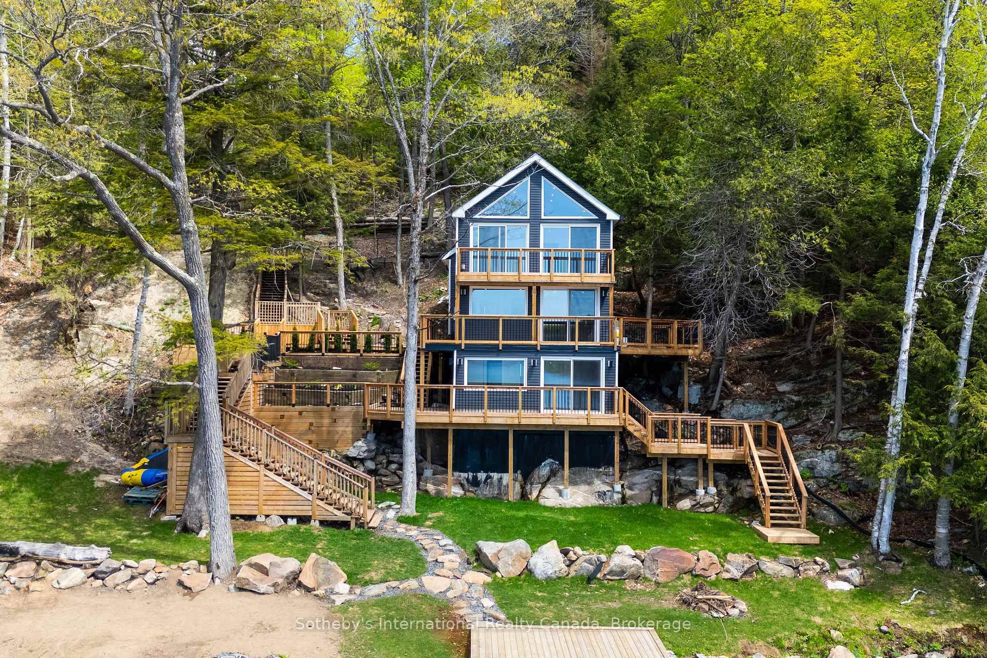 Welcome to 62 Mill Lake Trail a stylish, turn key retreat with over 275 feet of owned shoreline and exceptional privacy at the very end of the road.