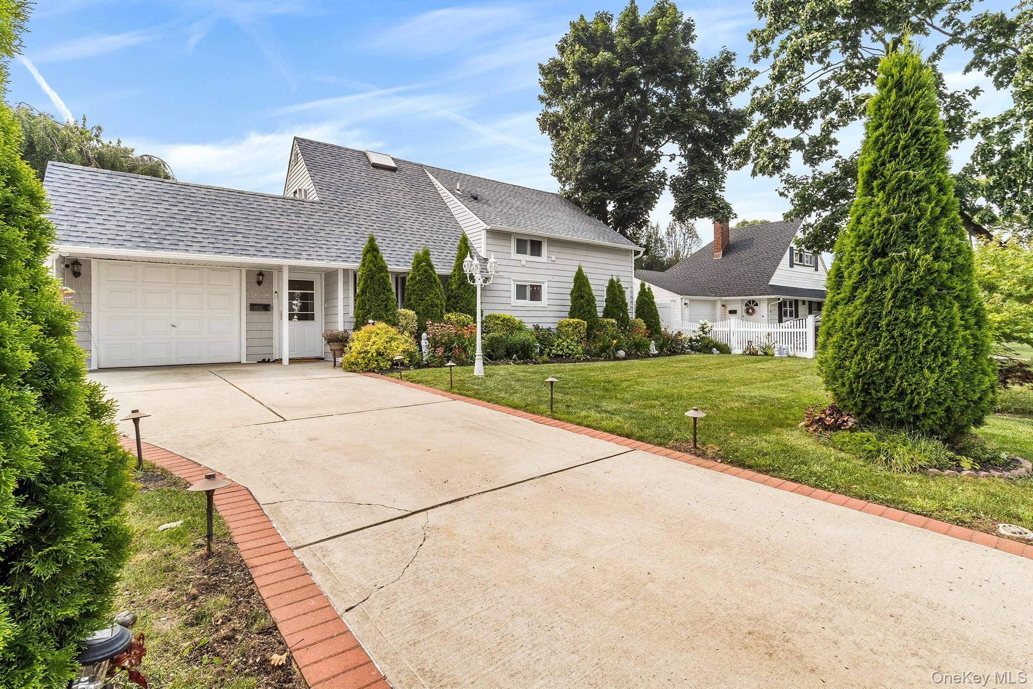 Thoughtfully maintained and enhanced with a variety of desirable features, this property offers comfort, convenience, and impressive outdoor details.