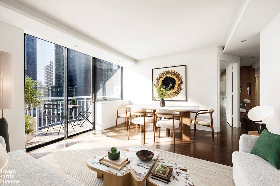 A Midtown East Gem Residence 25 is a sun drenched, top floor two bedroom home offering open, city views and a south facing balcony approximately 49 sqft.