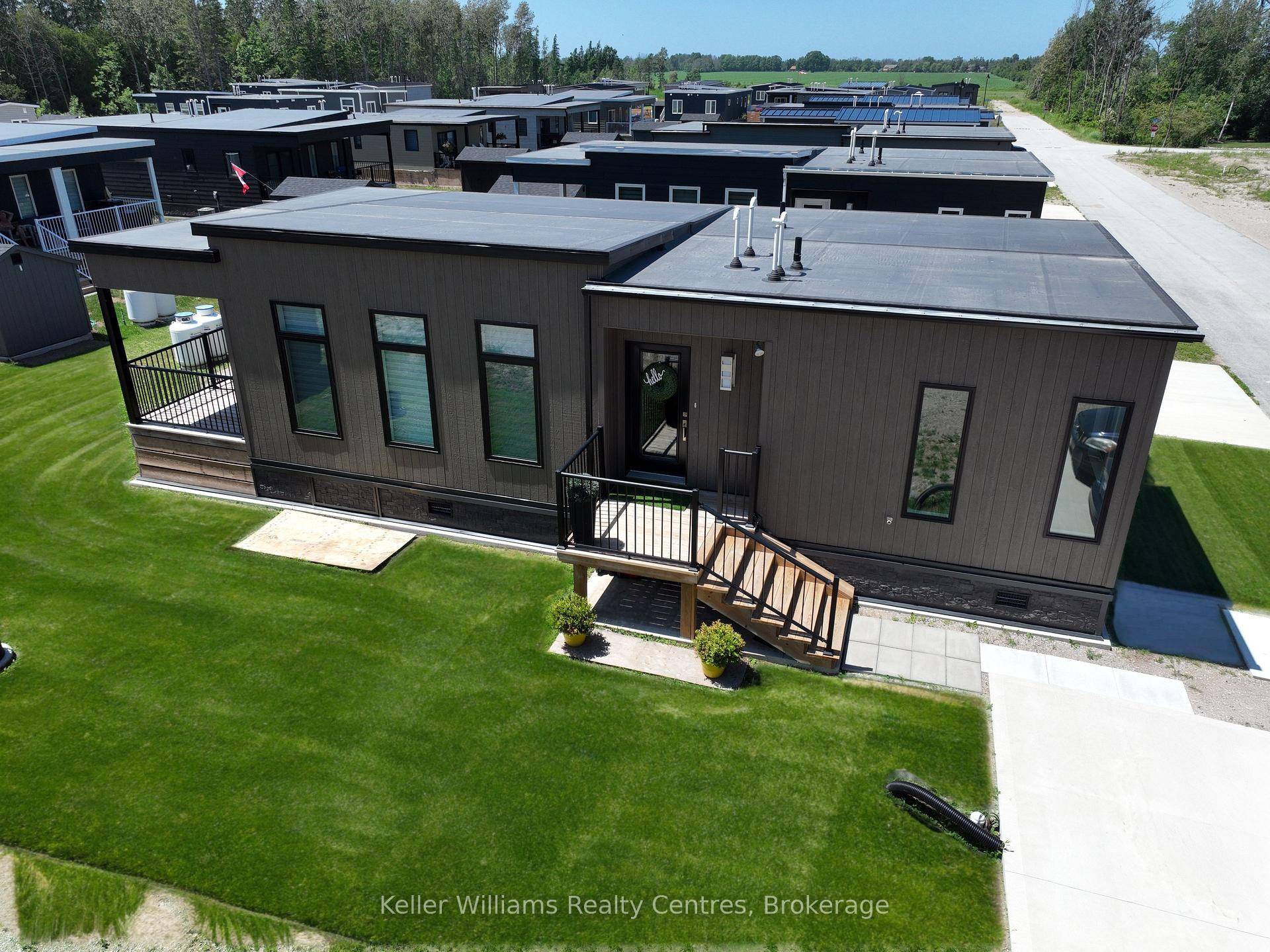 Nestled in the heart of charming Port Elgin, this stunning 2023 Ashfield model, built by Conquest, is a rare find at Port Elgin Estates, perfect for year round living or ...