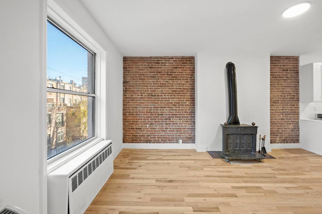 Have it all in this bright and beautiful north facing brownstone sponsor 1BR co op home with NO BOARD APPROVAL required.