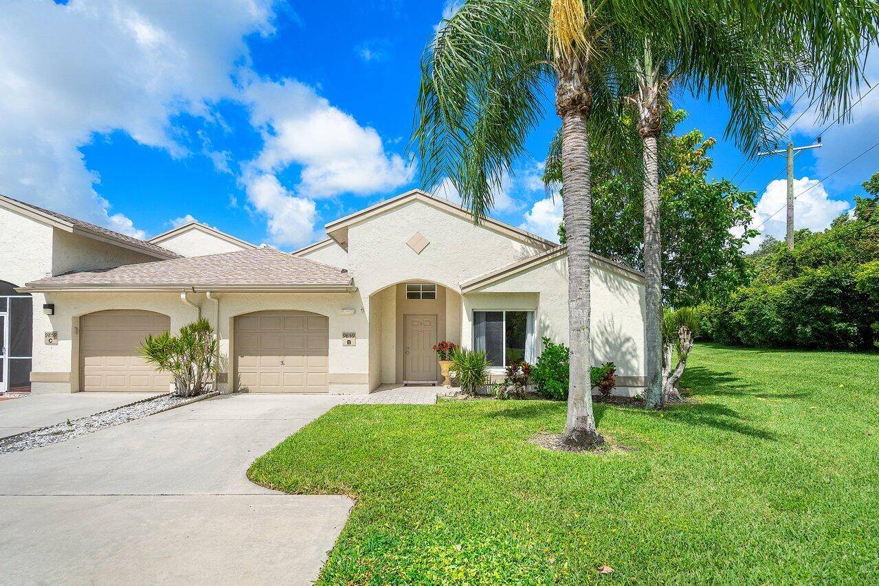 Welcome to your dream home in Boca Gardens.