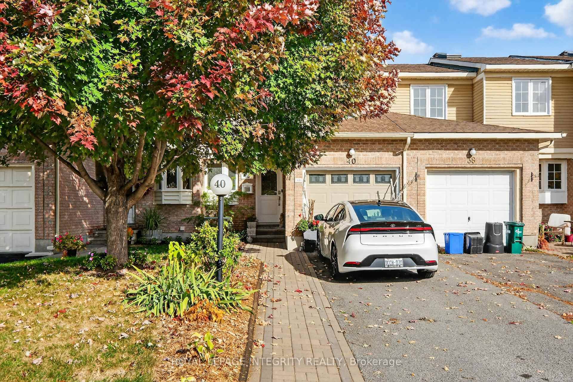 Welcome to this beautifully renovated and meticulously maintained townhome in a wonderful, hidden away part of Fisher Glen.
