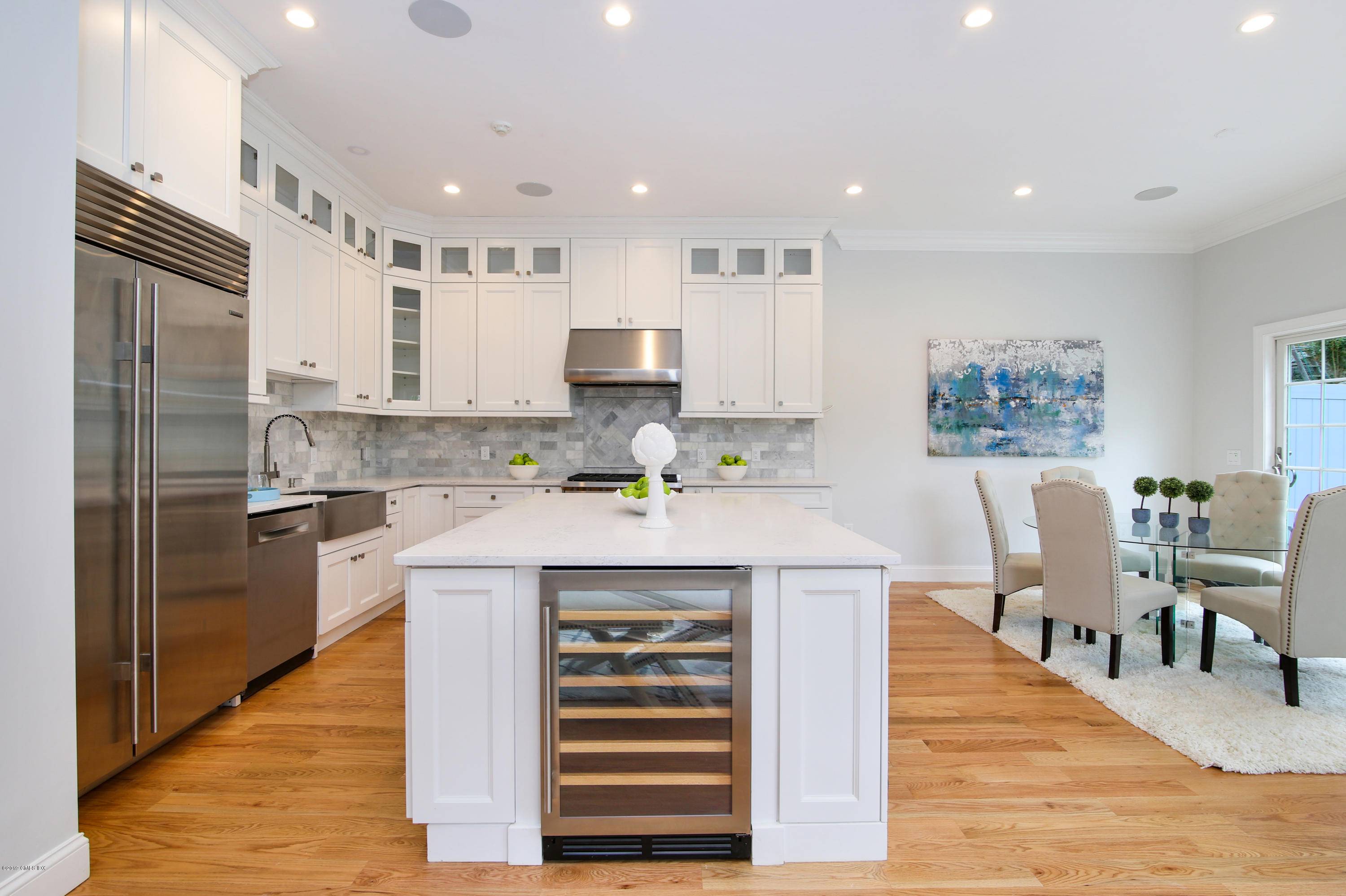 Luxurious, brand new construction four bedroom 3, 525 square foot townhome boasts stone patio, landscaped yard and attached two car garage convenient to schools, shopping and trains.