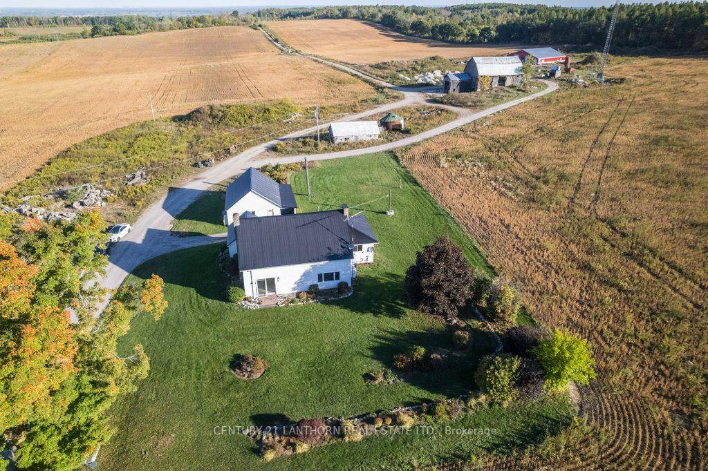 Discover the perfect blend of country living and working potential on this expansive 142 acre farm.