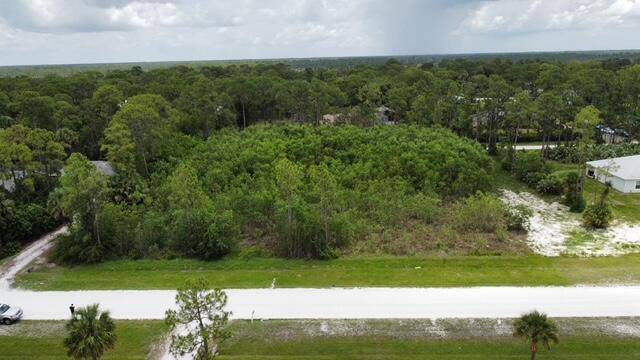 Ready to build ! High and dry, pull through lot, in a prime location !