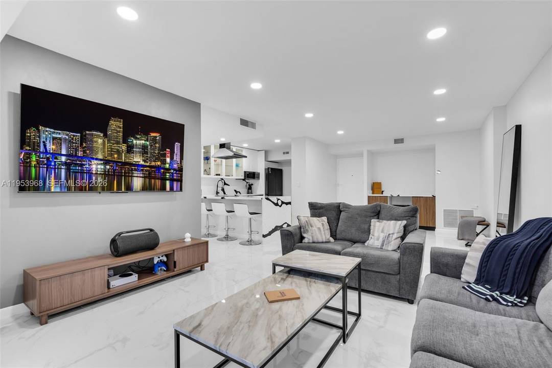 Step into a refined modern residence defined by clean lines, elevated finishes, and effortless sophistication.