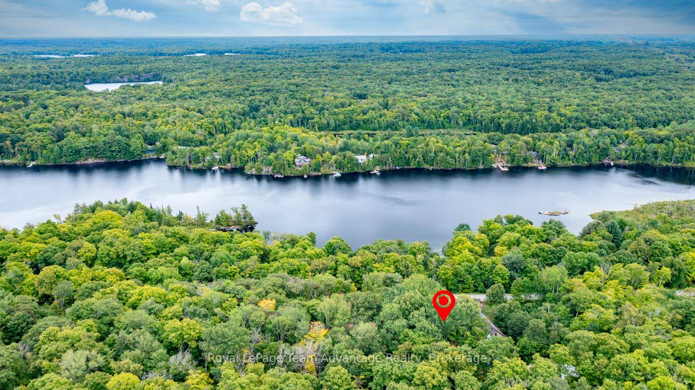0. 62 acres, year round road access, and close proximity to town.