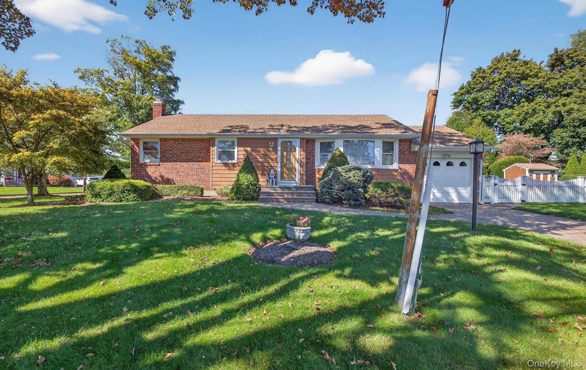 Welcome to 1 Marlowe Place, Greenlawn a charming ranch style home offering comfort, convenience, and move in ready appeal.
