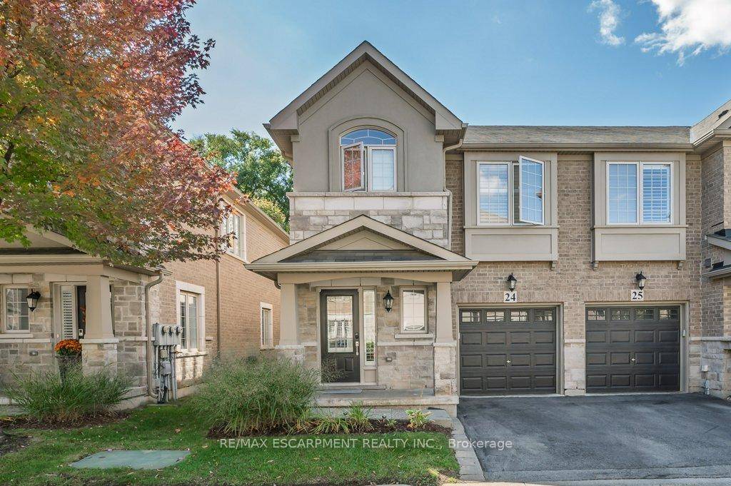 Welcome to this stunning end unit townhouse offering over 2, 330 sq.