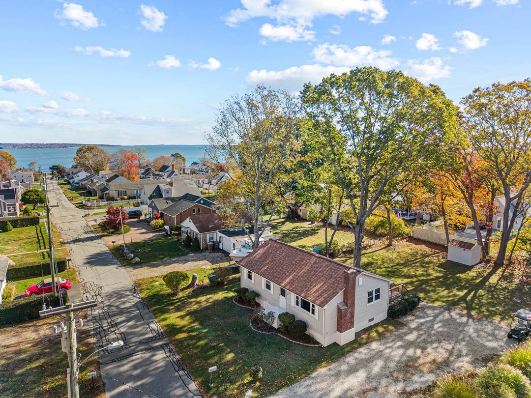 Located within the sought after Black Point Beach Association, this beautifully renovated coastal home blends modern style with timeless New England charm.