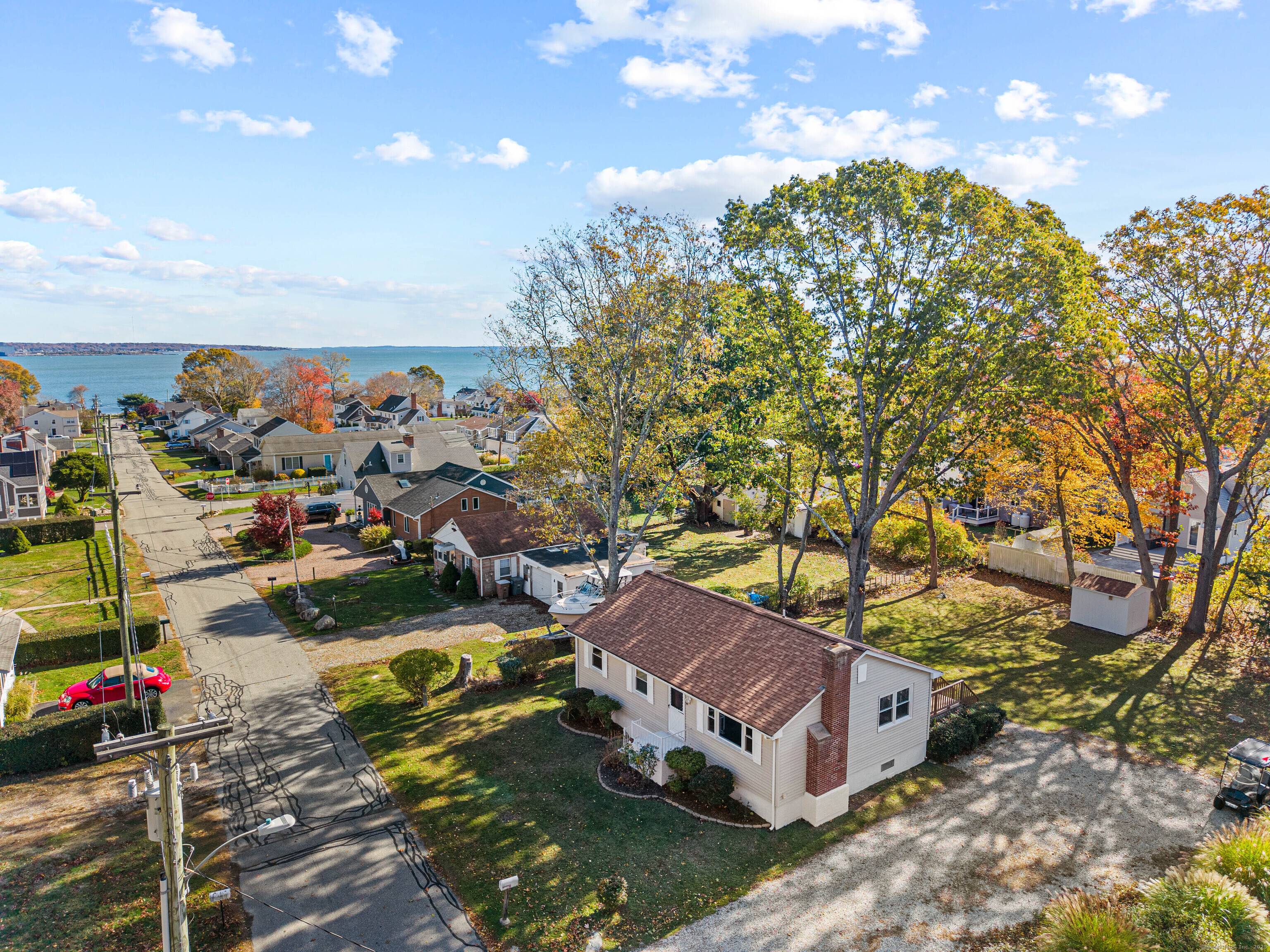 Located within the sought after Black Point Beach Association, this beautifully renovated coastal home blends modern style with timeless New England charm.