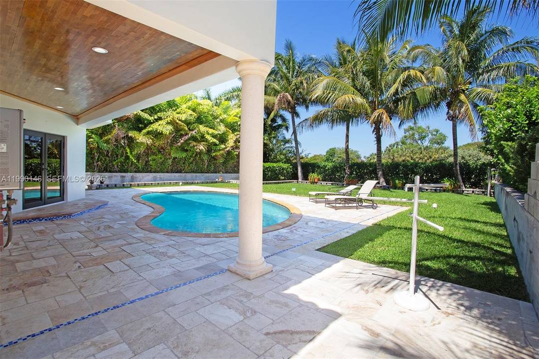 Located on a private gated island in Miami Beach, this residence sits on the 12th hole of the Miami Beach Golf Club and features one of the best lots on ...