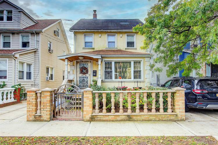 This charming colonial residence in Saint Albans offers spacious living with four bedrooms, two full bathrooms, and a finished attic, perfect for family comfort and versatility.