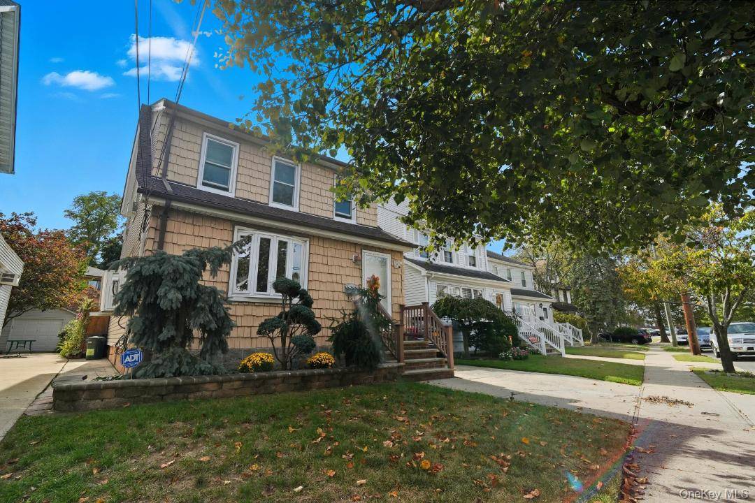 Nestled on a serene street near the Queens Village Bellerose border, this detached single family home combines comfort and versatility.