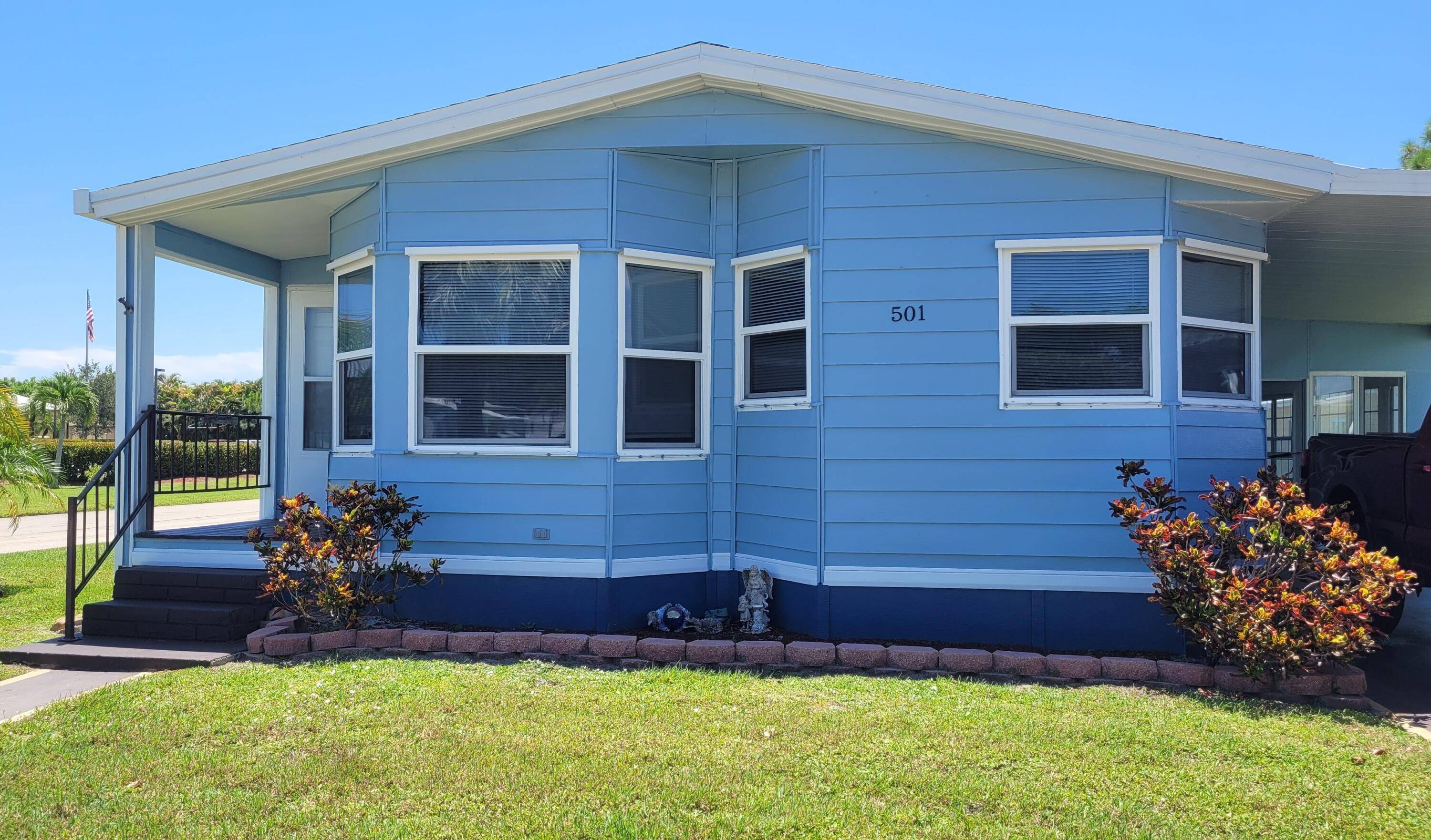 Pretty corner home in desirable 55 community.