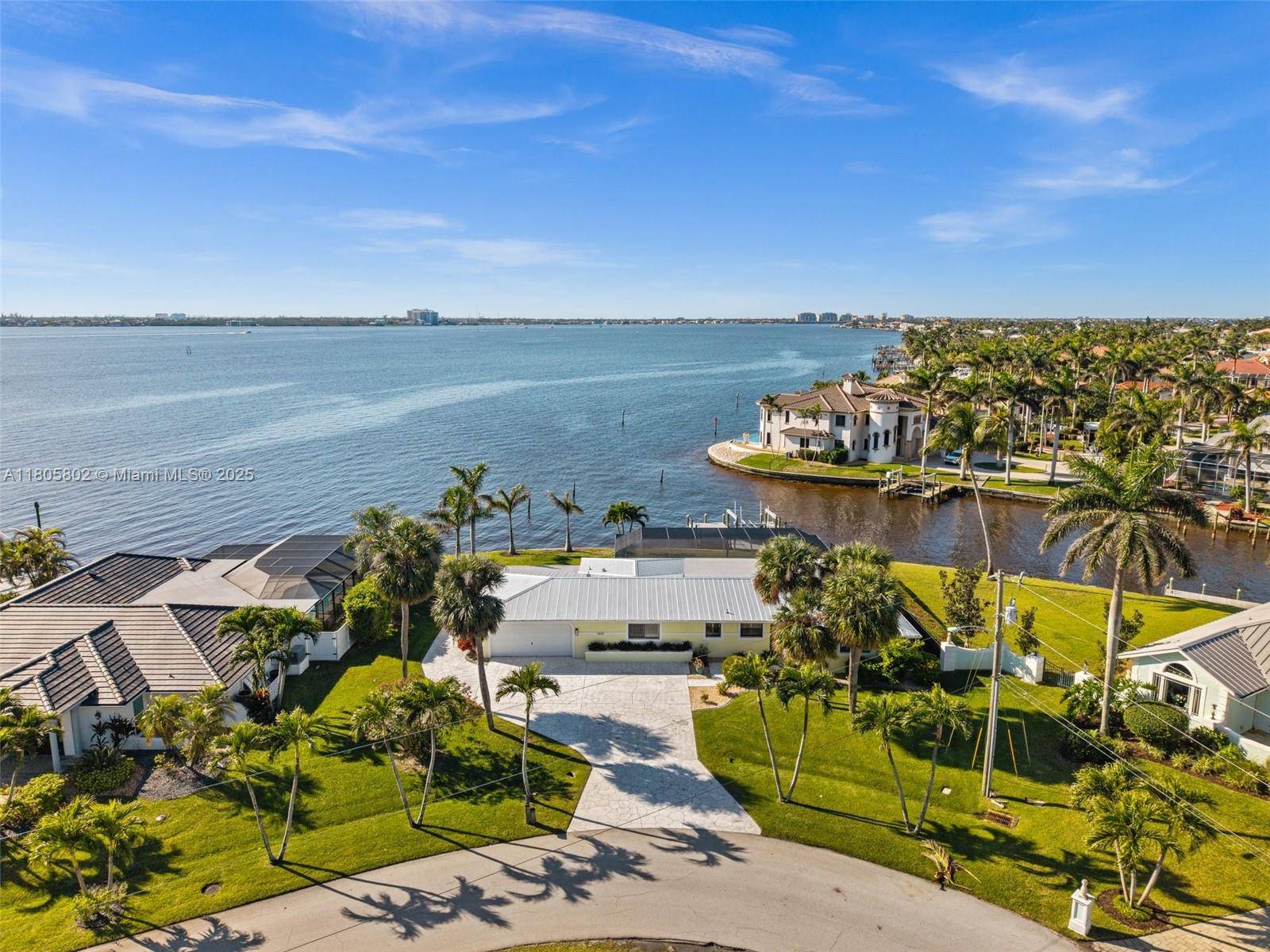 Welcome to 1600 Edith Esplanade, where panoramic Caloosahatchee River views define the SW Florida lifestyle.