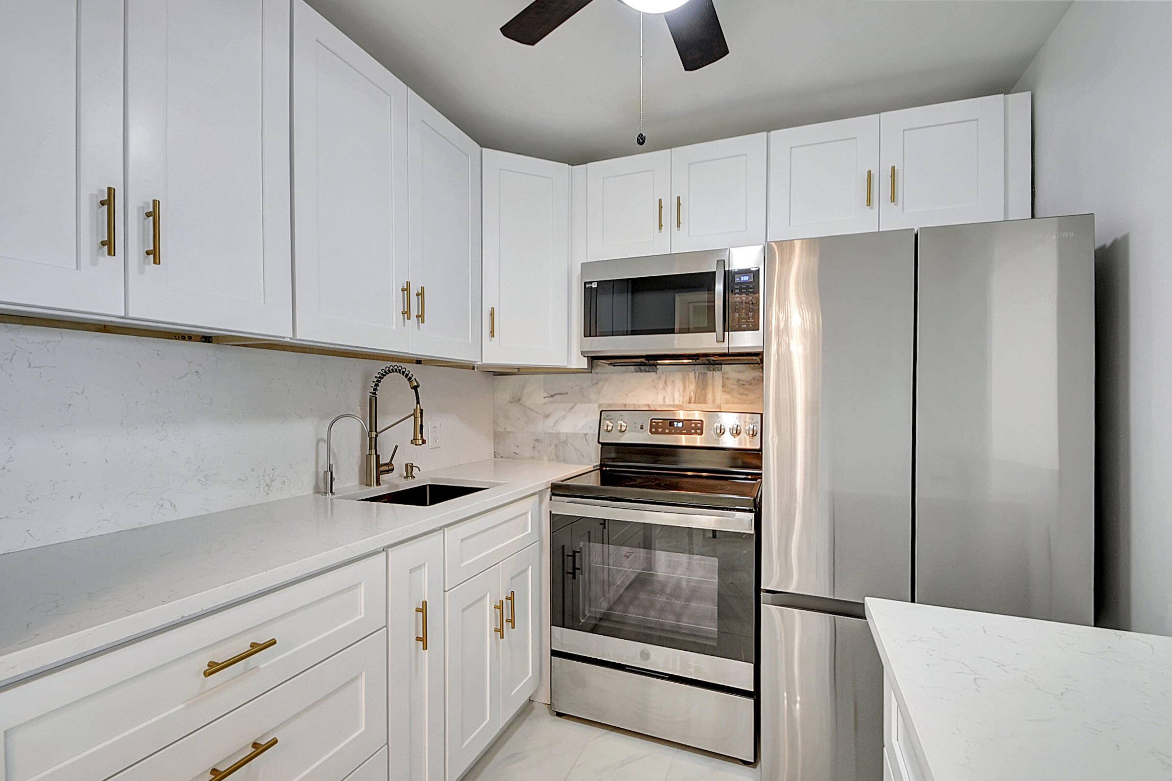 This beautiful recently updated 1 bedroom 1 bath 2nd floor condo is located in an active 55 gated community called Century Village in West Palm Beach.
